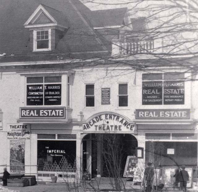 b&w photo: Harris real estate office on 2nd floor, Arcade theatre below