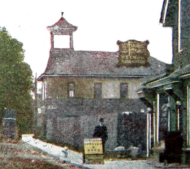 colorized print, man walking on sidewalk in front of fence between 2 buildings