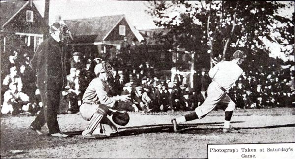 A right-handed batter in full swing. Catcher and umpire wait for the pitch that doesn't arrive