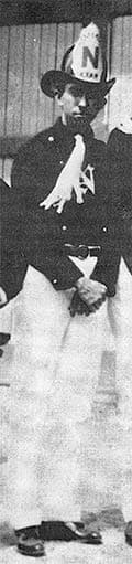 young man in fireman's uniform