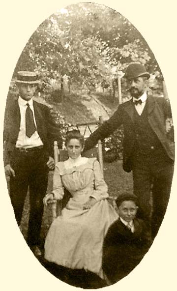 outdoor family portrait; young man, child, mother, father