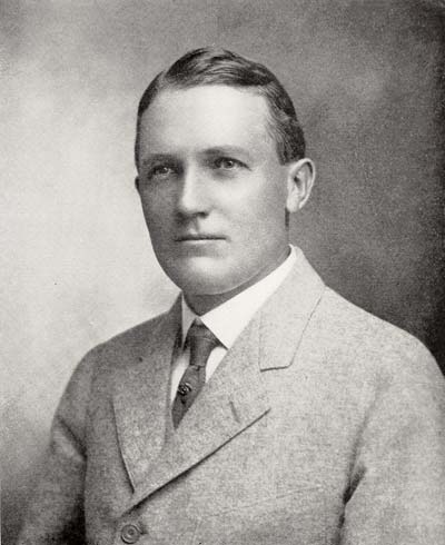 man in light suit and tie
